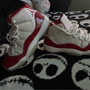 Red and White Jordan 11 Sneakers with Patent Leather